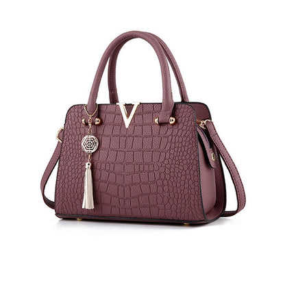 Sac à Main Élégant à Motif Texturé avec Pendentif Décoratif