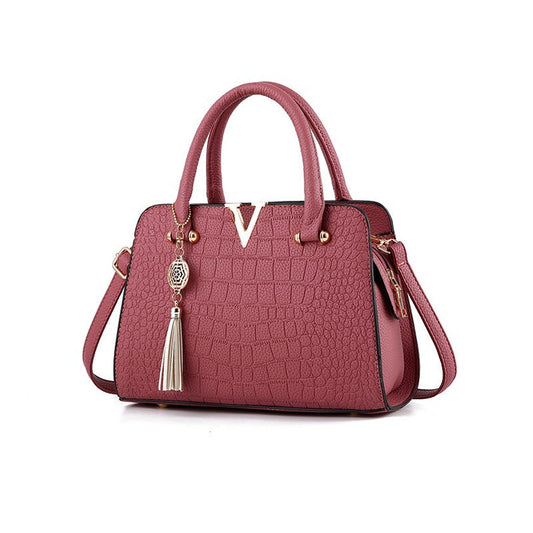 Sac à Main Élégant à Motif Texturé avec Pendentif Décoratif
