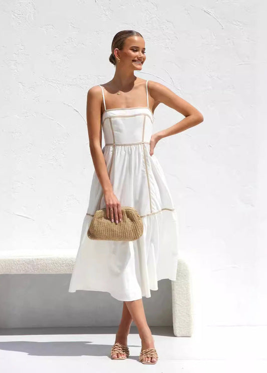 Robe mi-longue à bretelles fines et jupe volantée